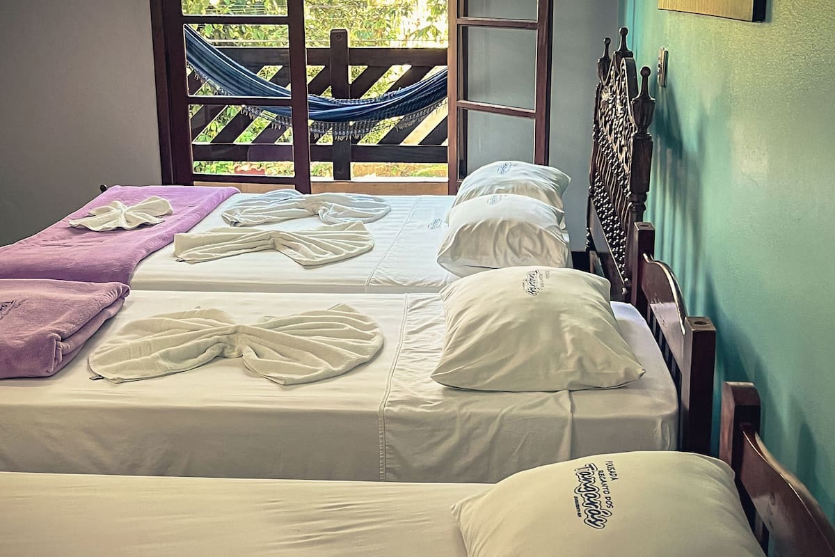 Family Room | Minibar, WiFi (free), bed sheets