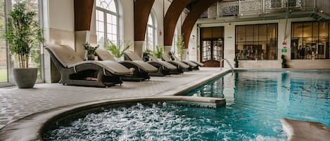 Indoor pool, open 7 AM to 9 PM, pool loungers