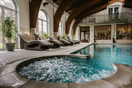Indoor pool, open 7 AM to 9 PM, pool loungers. Rowton Hall Hotel and Spa