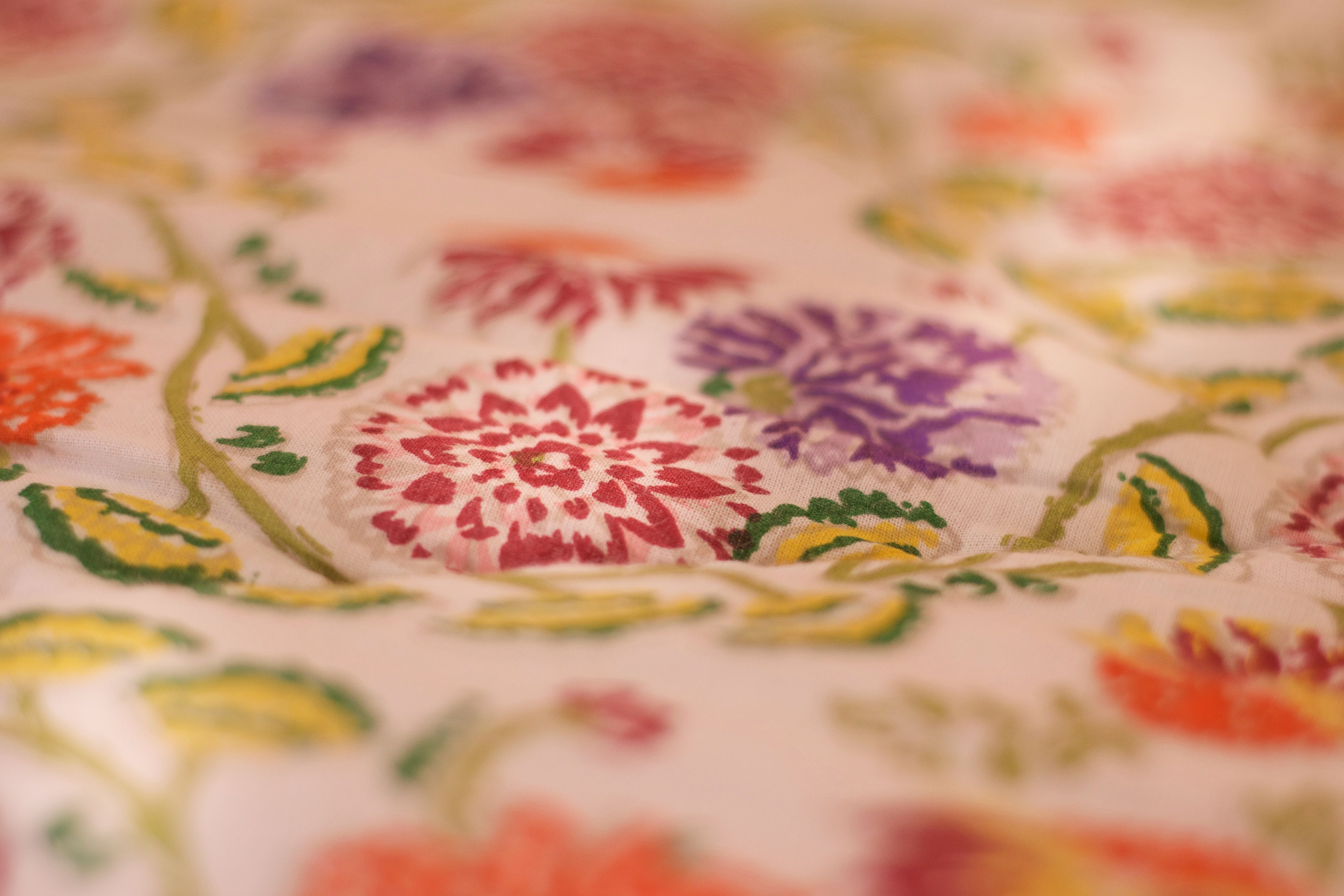 A close-up of a fabric with a floral pattern.
