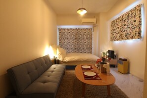 Desk, laptop workspace, blackout curtains, free WiFi