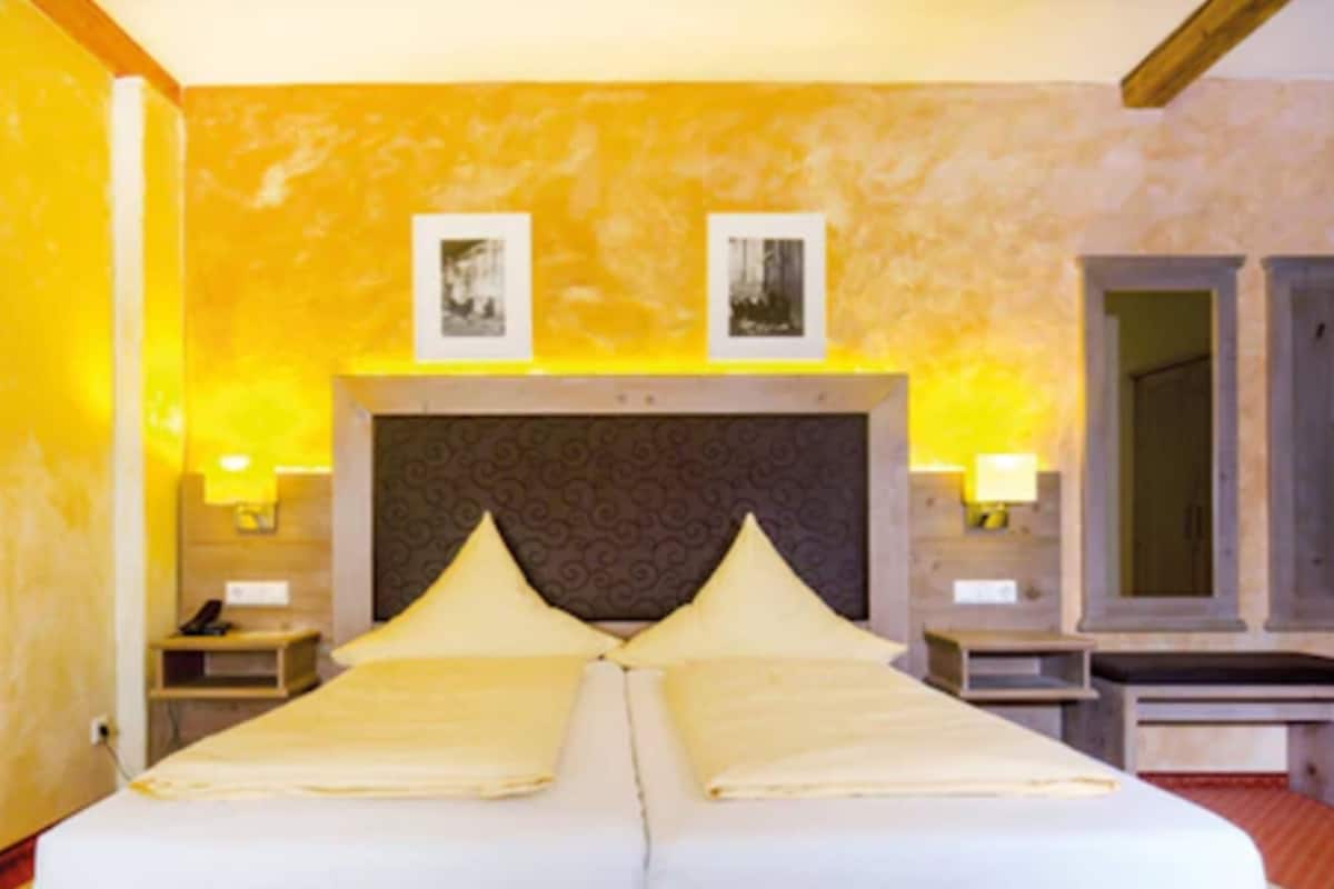 Een kluis op de kamer, extra bedden, gratis wifi, beddengoed