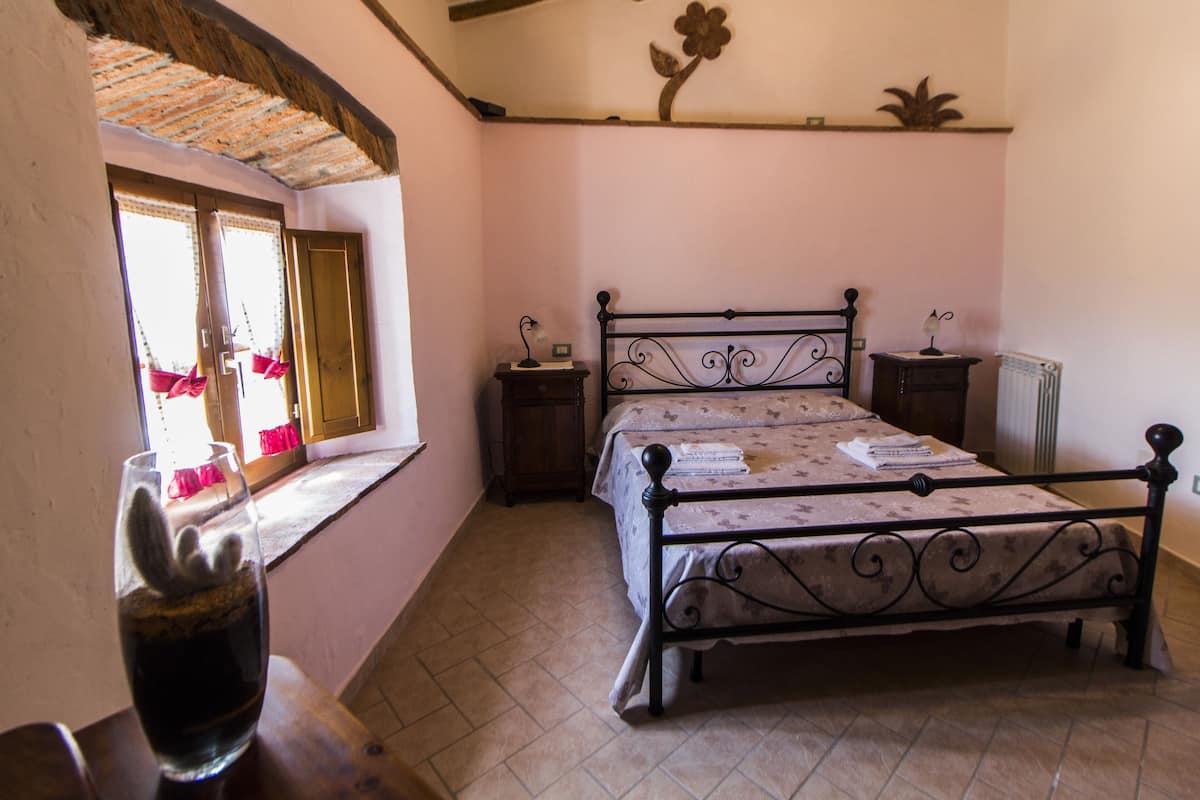 Premium bedding, blackout curtains, iron/ironing board, free WiFi