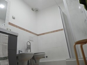 Double or Twin Room | Bathroom | Shower, hair dryer, bidet, towels