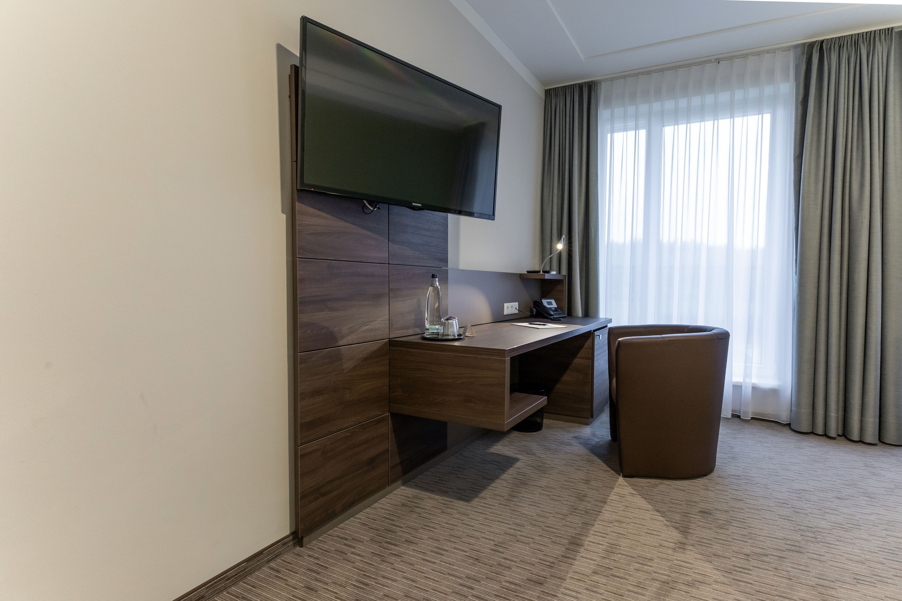 premium double room (large ) | living area | flat-screen tv