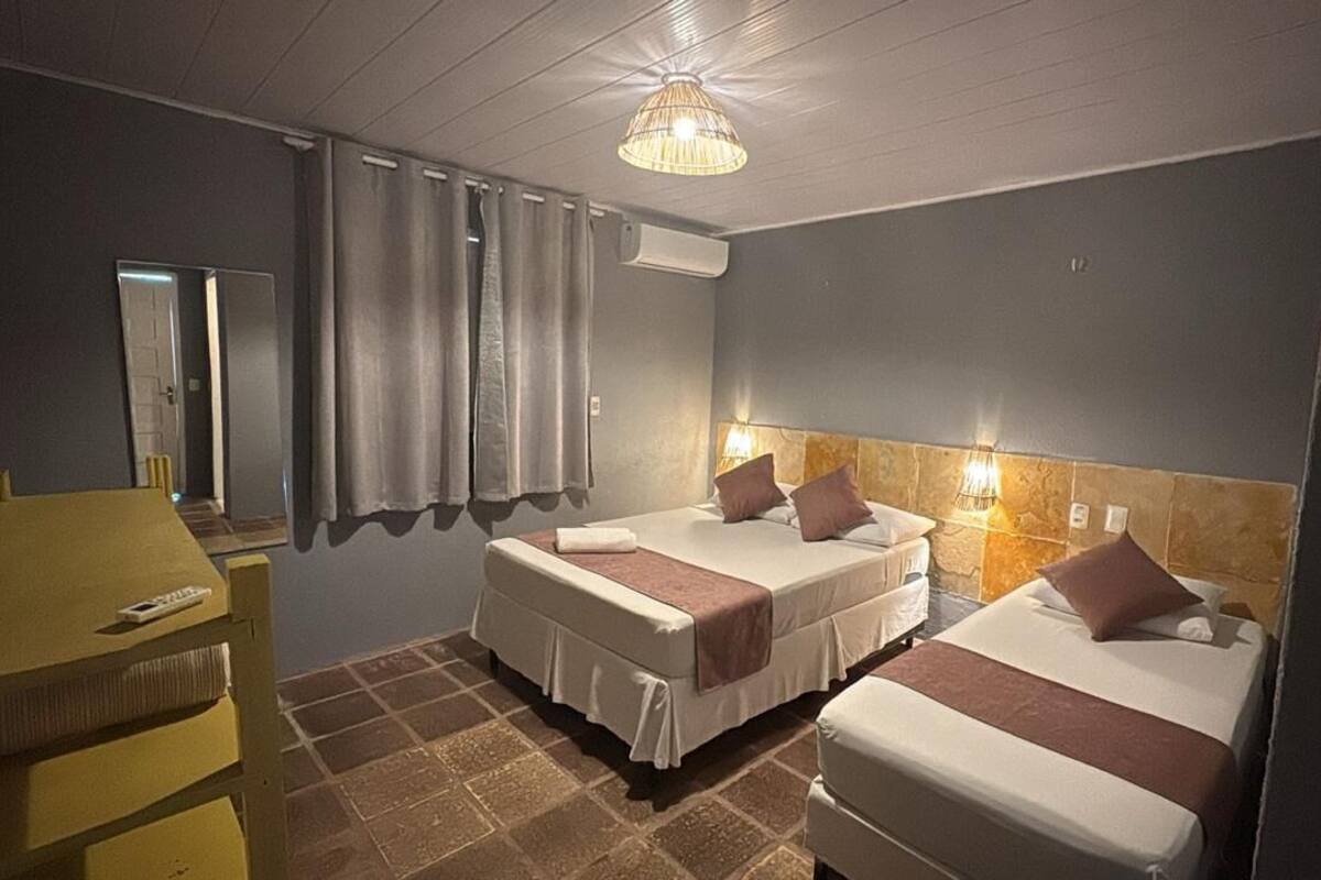 Grand Triple Room | Minibar, individually furnished, blackout drapes, free WiFi