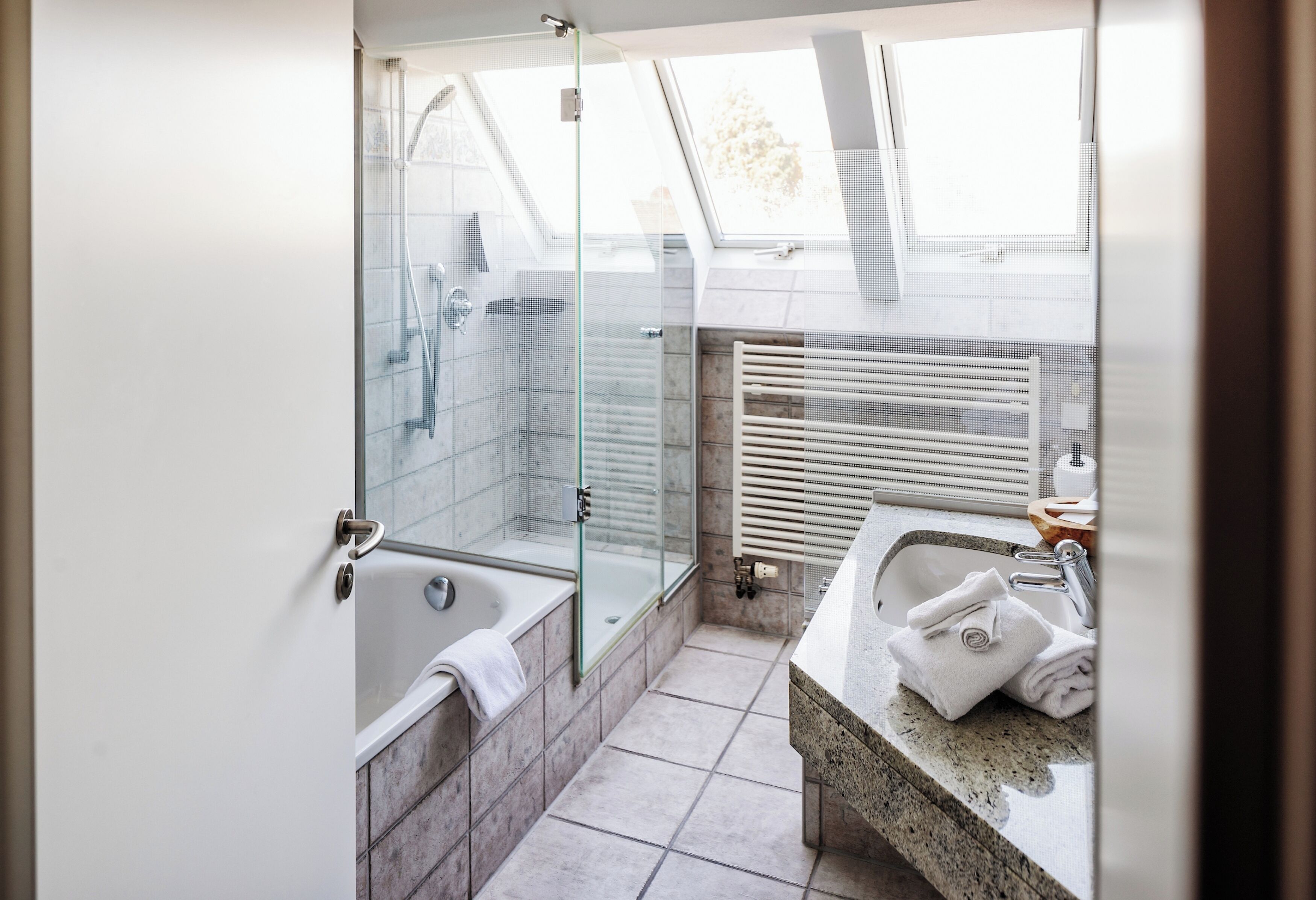 deluxe double room | bathroom | shower, free toiletries, hair dryer, bathrobes