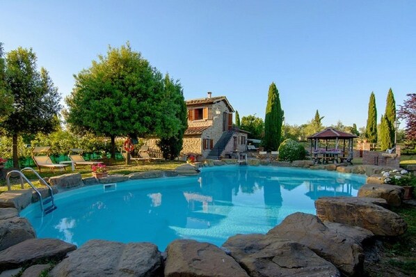 2 outdoor pools, pool umbrellas, pool loungers