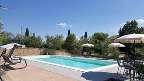 2 outdoor pools, pool umbrellas, pool loungers