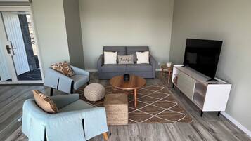 47-inch flat-screen TV with cable channels