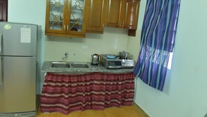 Standard Apartment | Private kitchen - Nice House (Hanoi)