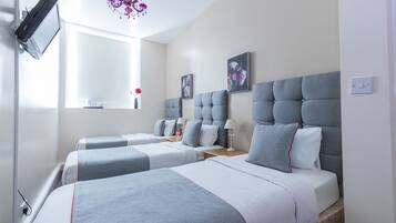 Standard Triple Room, Shared Bathroom | Desk, free WiFi