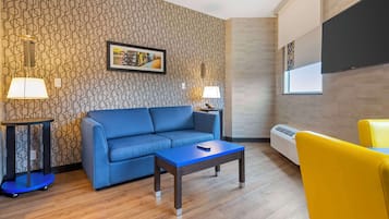 Suite, 1 King Bed, Non Smoking, Refrigerator & Microwave (with Sofabed) | Pillowtop beds, in-room safe, blackout drapes, iron/ironing board