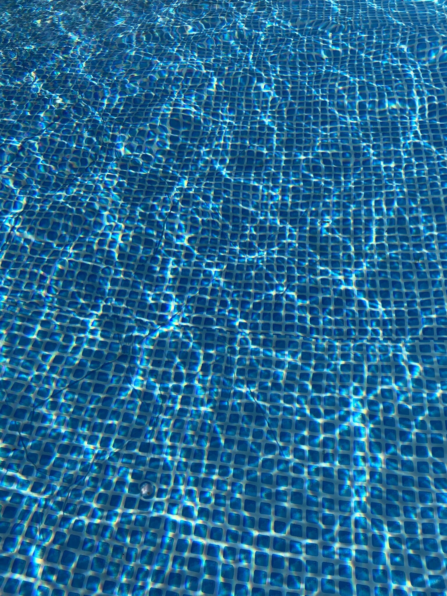 Seasonal outdoor pool, open 4:00 PM to 9:00 PM, pool umbrellas