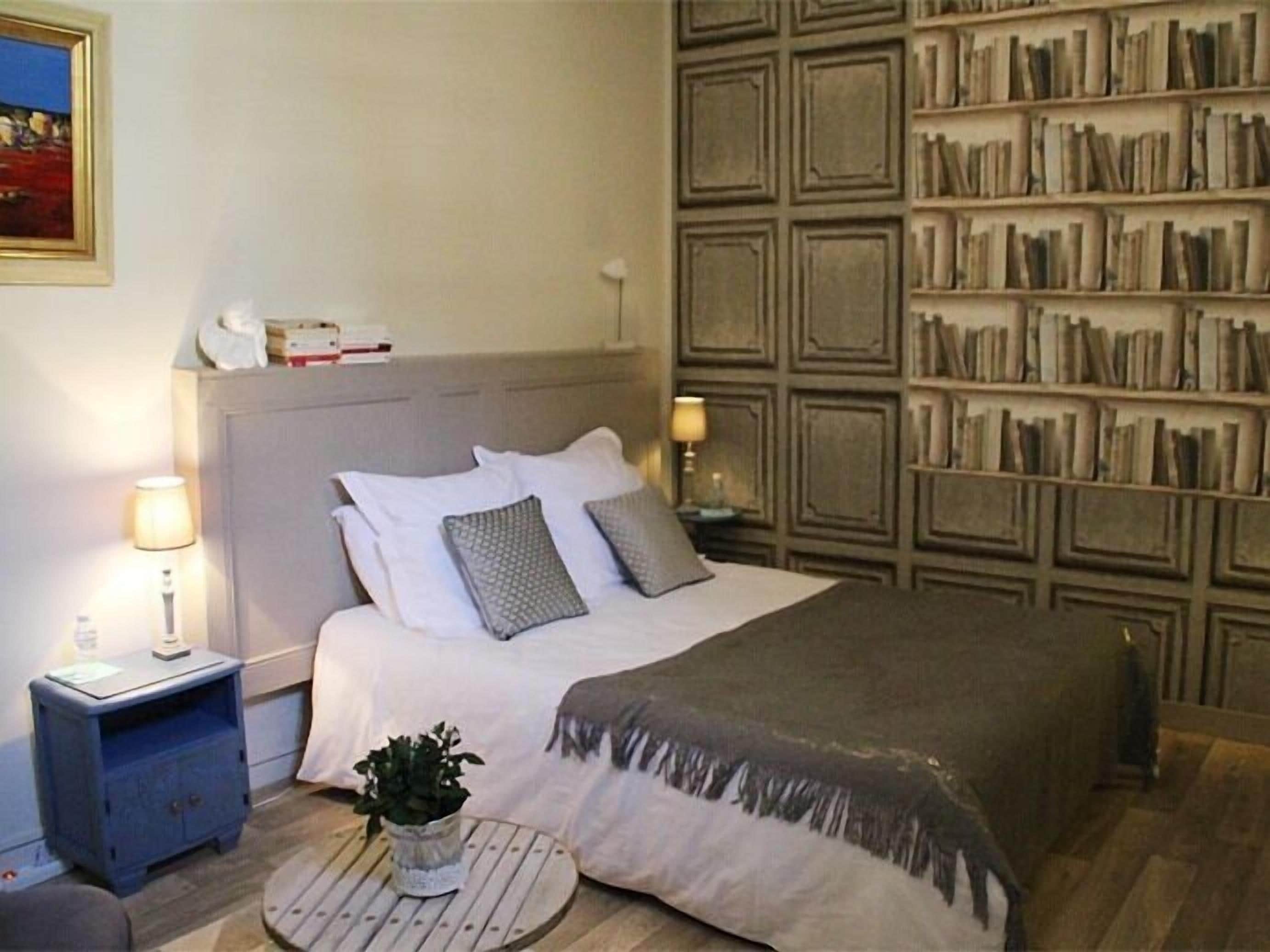 Foto - Une Chambre en Ville