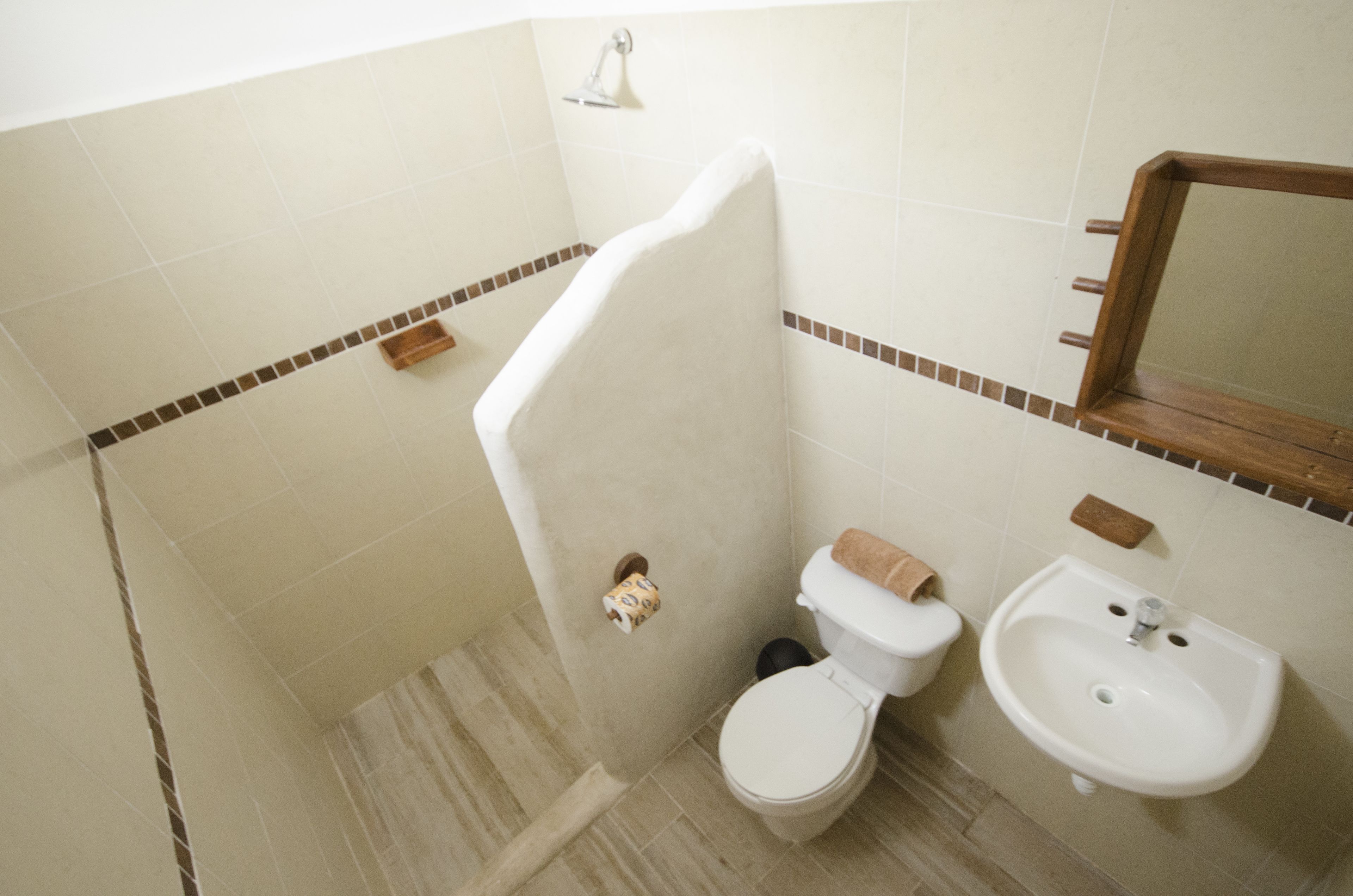 comfort room, 1 king bed, private bathroom | bathroom | shower, rainfall showerhead, hair dryer, towels