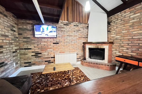 Familienzimmer | Wohnbereich | Flachbildfernseher