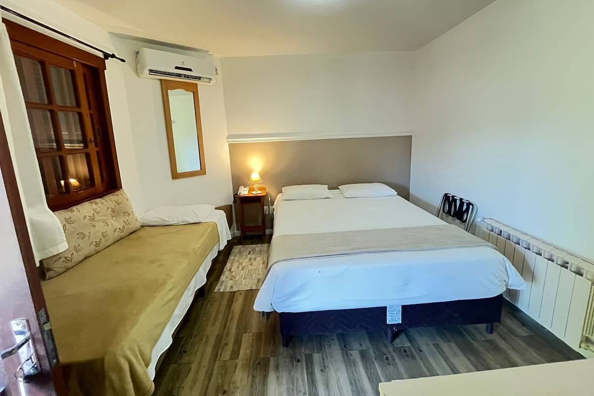 Basic Triple Room, 1 Double Bed with Sofa bed | Free WiFi, bed sheets