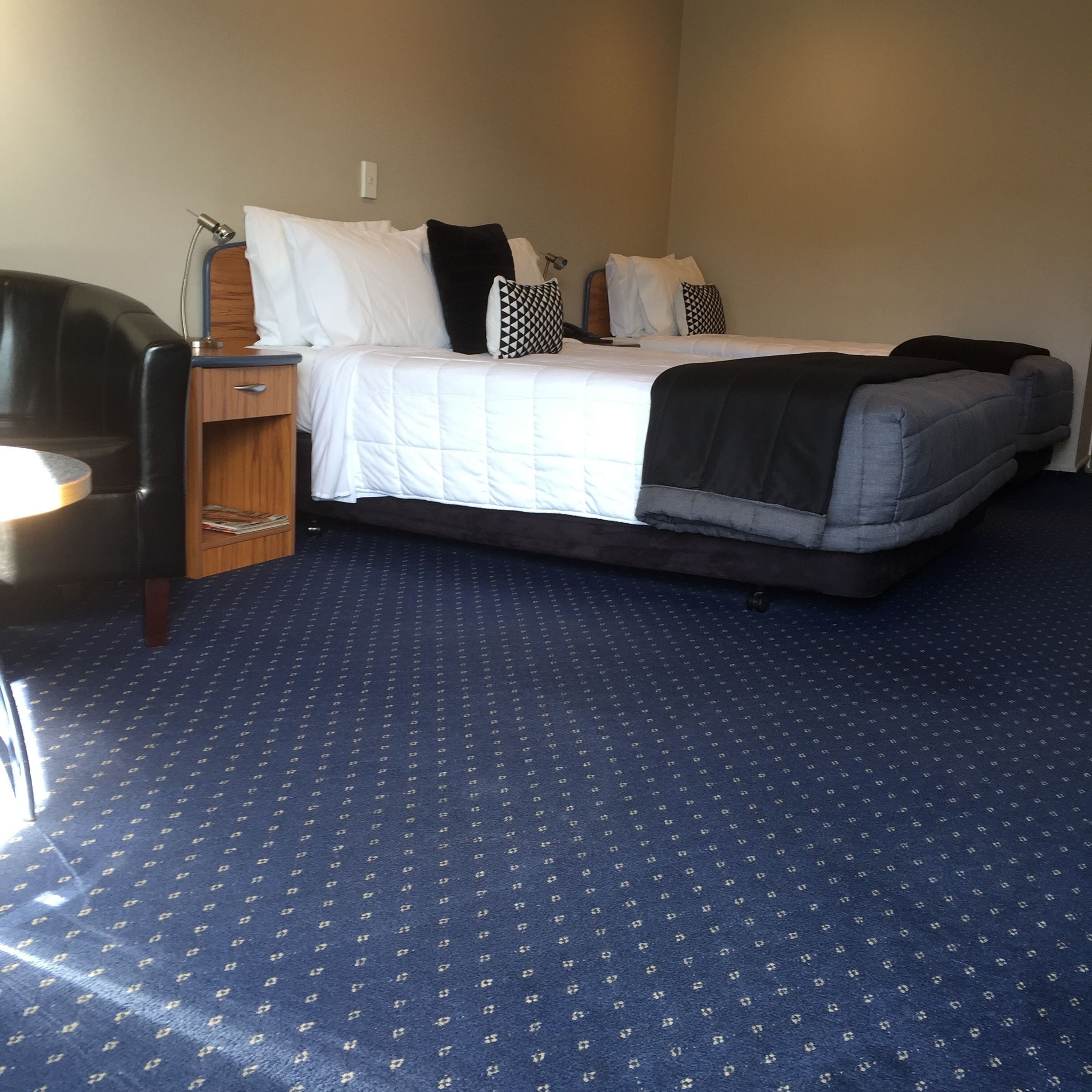 Pillow-top beds, desk, laptop workspace, blackout curtains