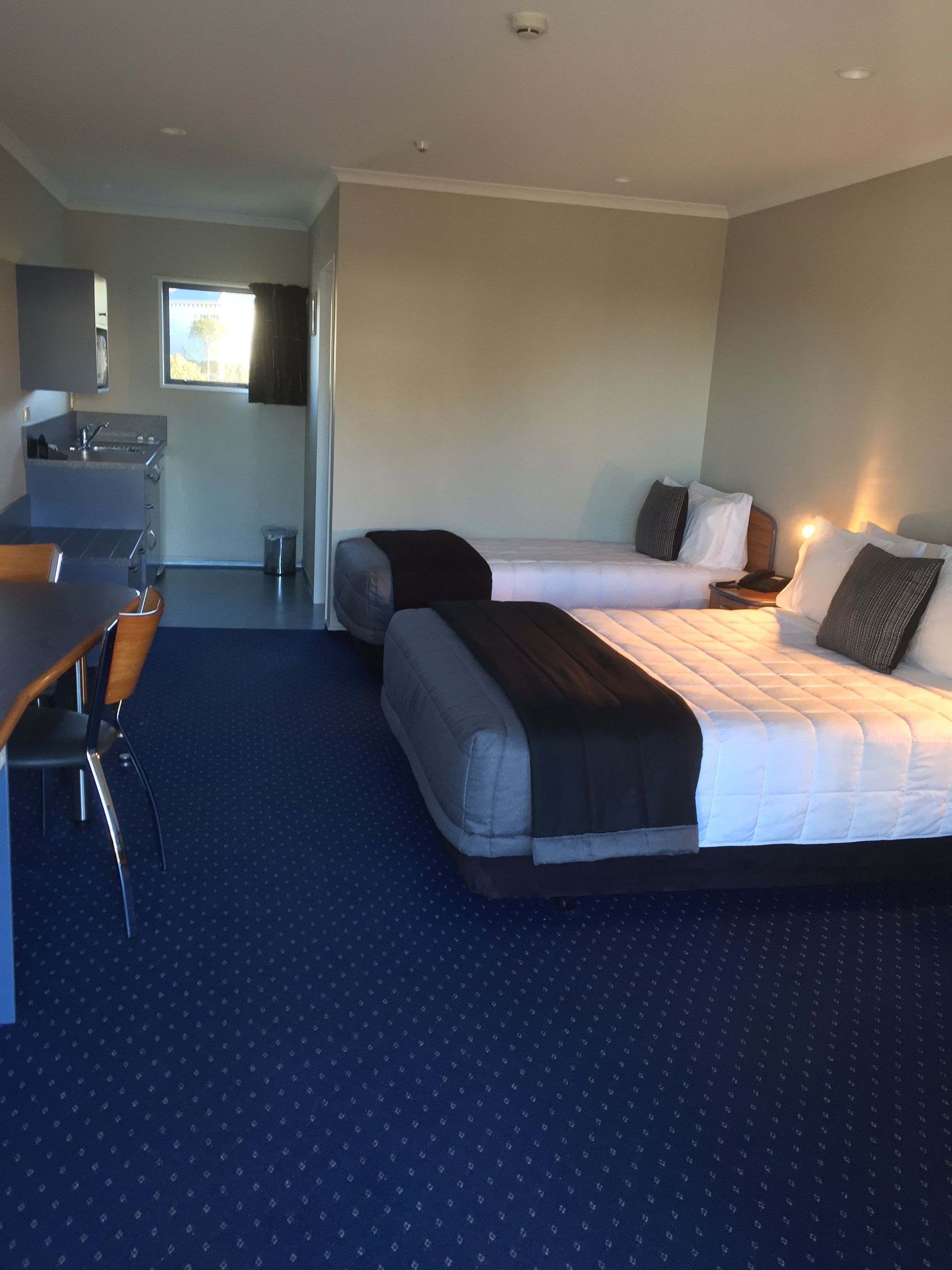 Pillow-top beds, desk, laptop workspace, blackout curtains