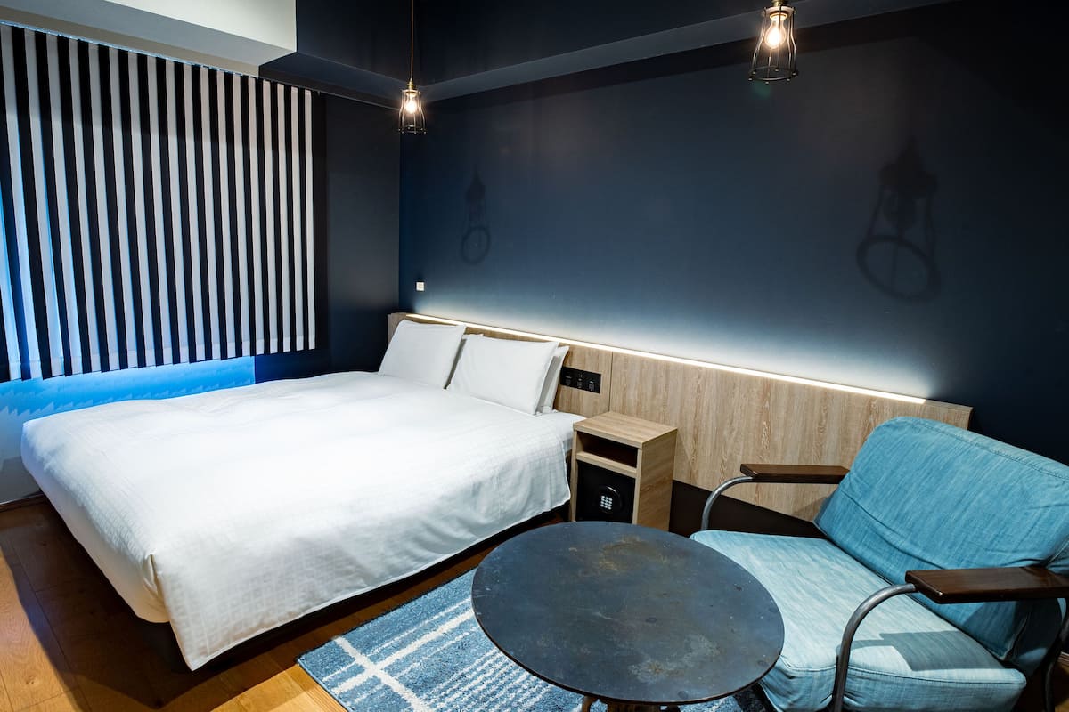 Deluxe-Doppelzimmer | Daunenbettdecken, Zimmersafe, Schreibtisch, Verdunkelungsvorhänge