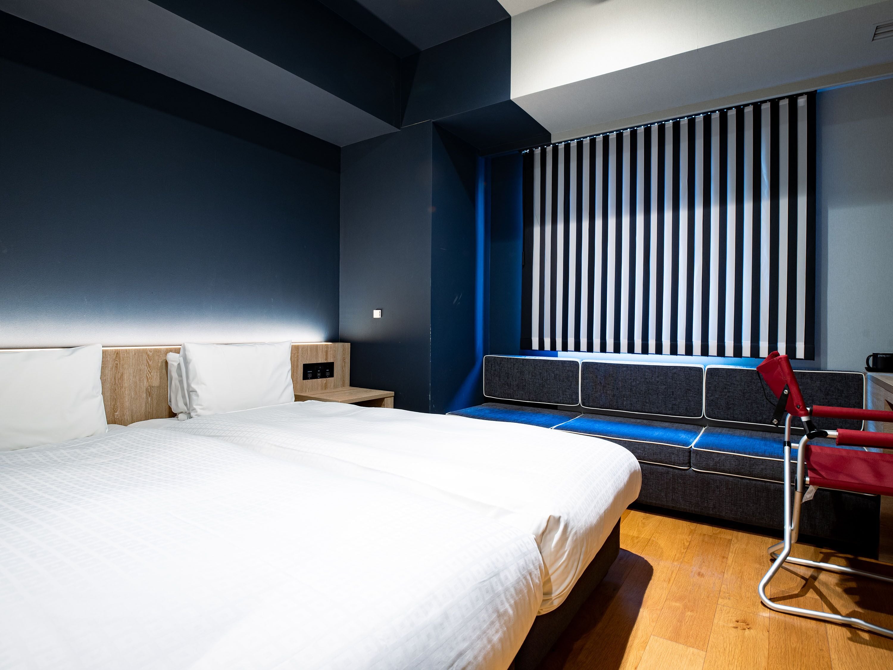 Moderate Twin Room | Down comforters, in-room safe, desk, blackout drapes