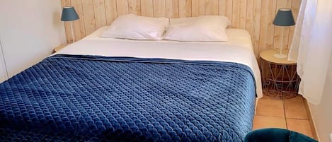 Iron/ironing board, travel crib, free WiFi, bed sheets