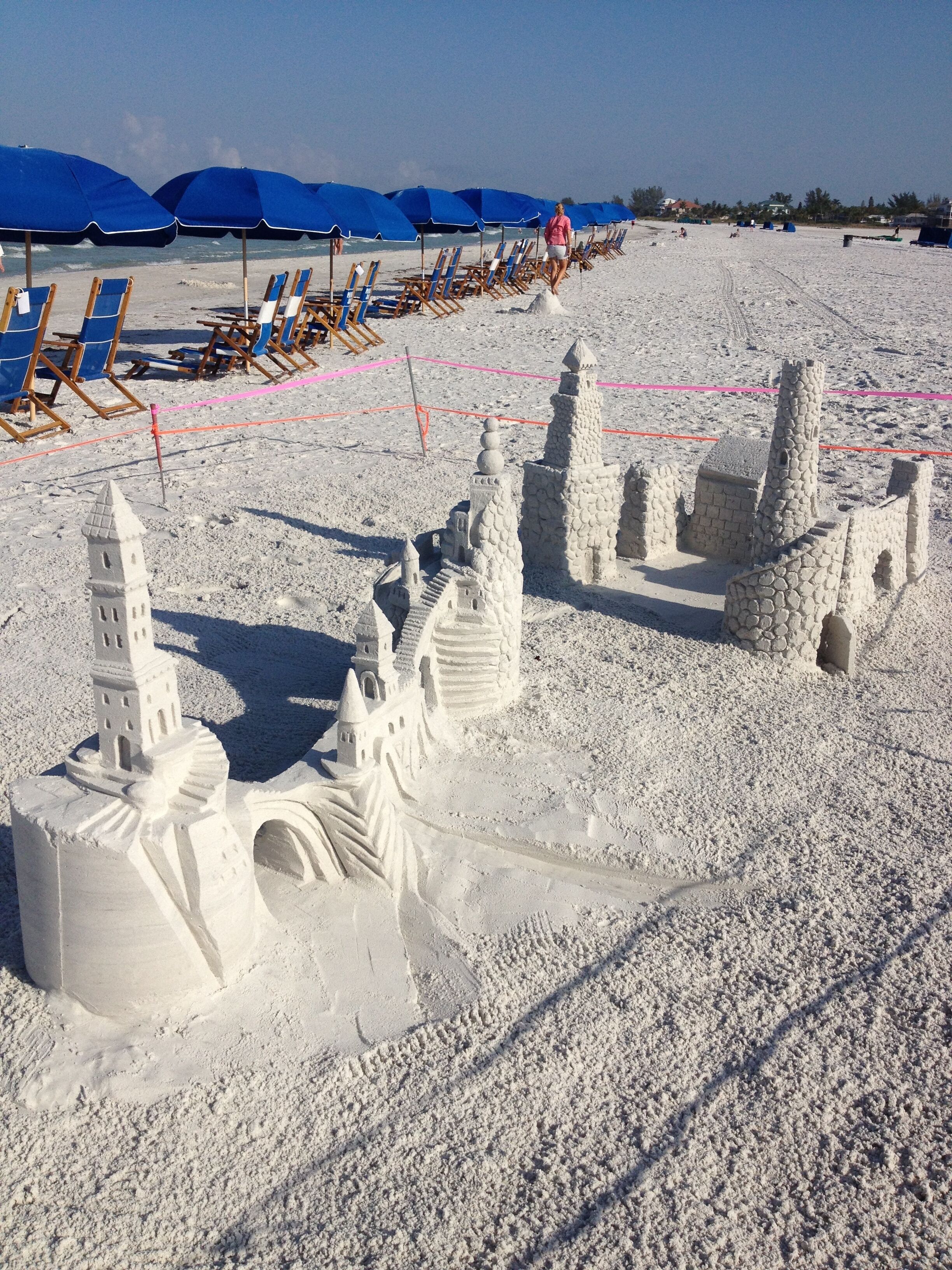 On the beach, sun loungers, beach towels