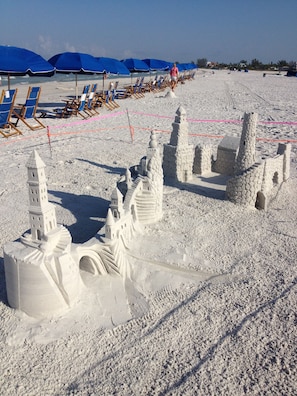 On the beach, sun-loungers, beach towels