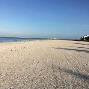 On the beach, sun loungers, beach towels