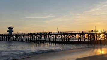 On the beach, sun-loungers, beach towels