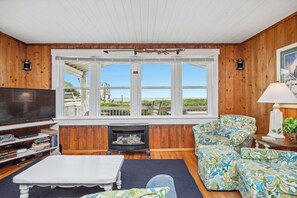 Televisión, reproductor de DVD, libros y videoteca 