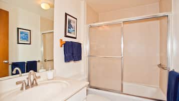 Combined shower/tub, hair dryer, towels, toilet paper