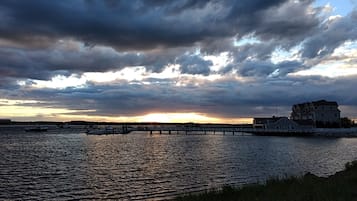 On the beach, sun-loungers