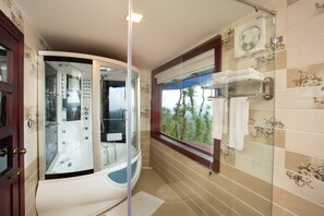 Suite de lujo, 1 habitación, vistas al valle | Baño | Ducha y cabezal de ducha tipo lluvia