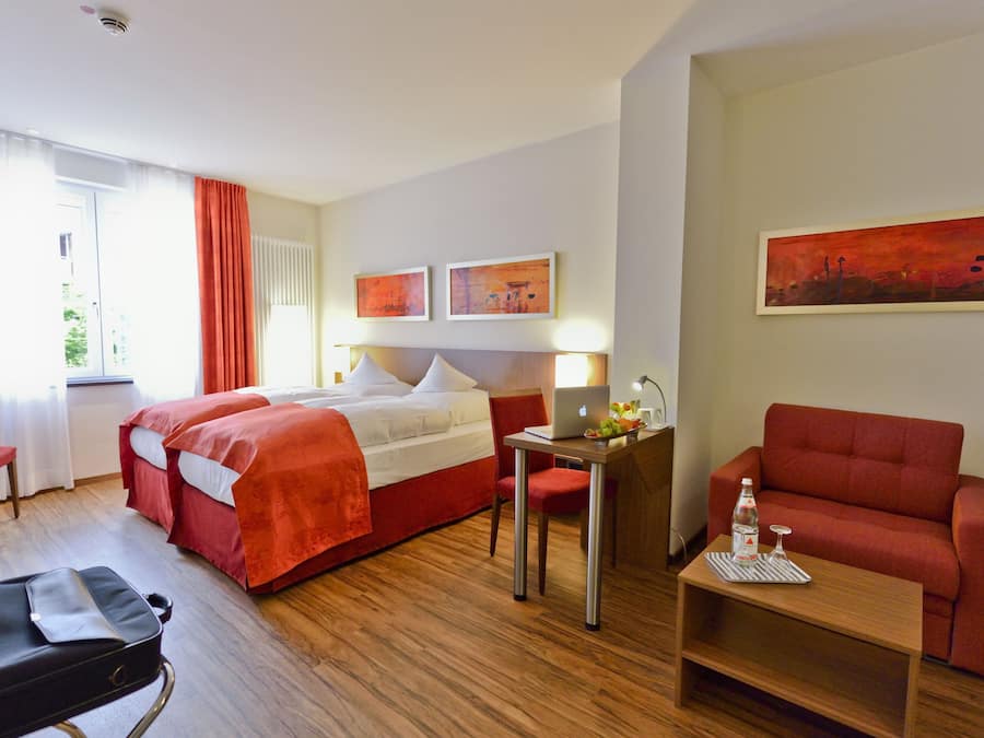 Laptop workspace, blackout curtains, free WiFi, bed sheets