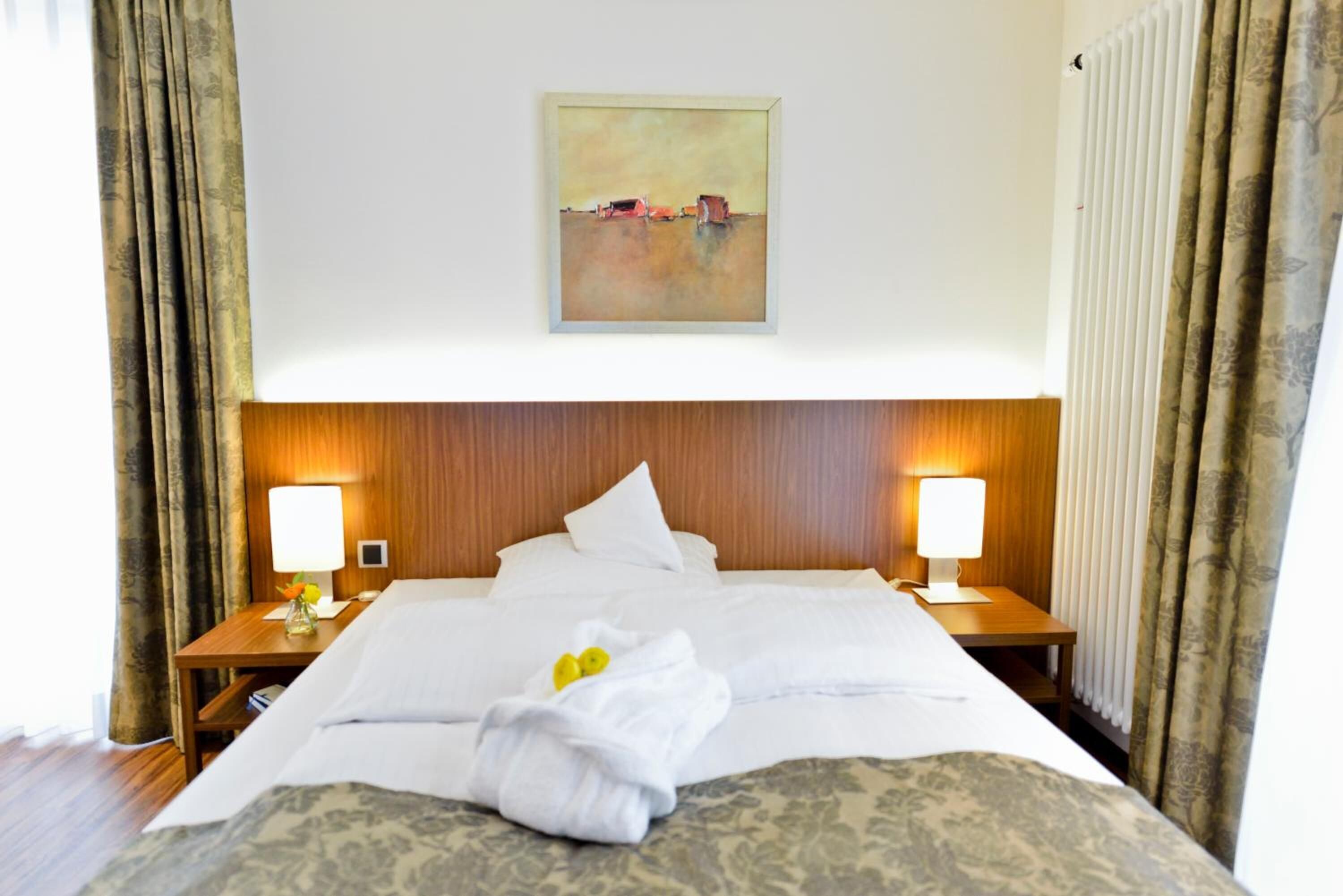 laptop workspace, blackout curtains, free wifi, bed sheets