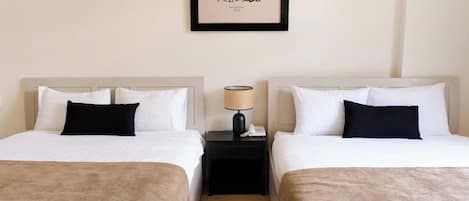 Quadruple Room | Minibar, in-room safe, desk, free WiFi