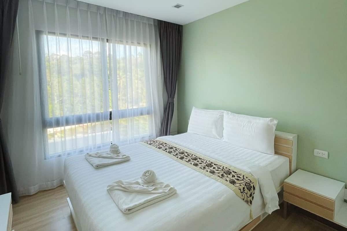 Deluxe One-Bedroom Condo | 遮光布/窗簾、免費無線上網、床單