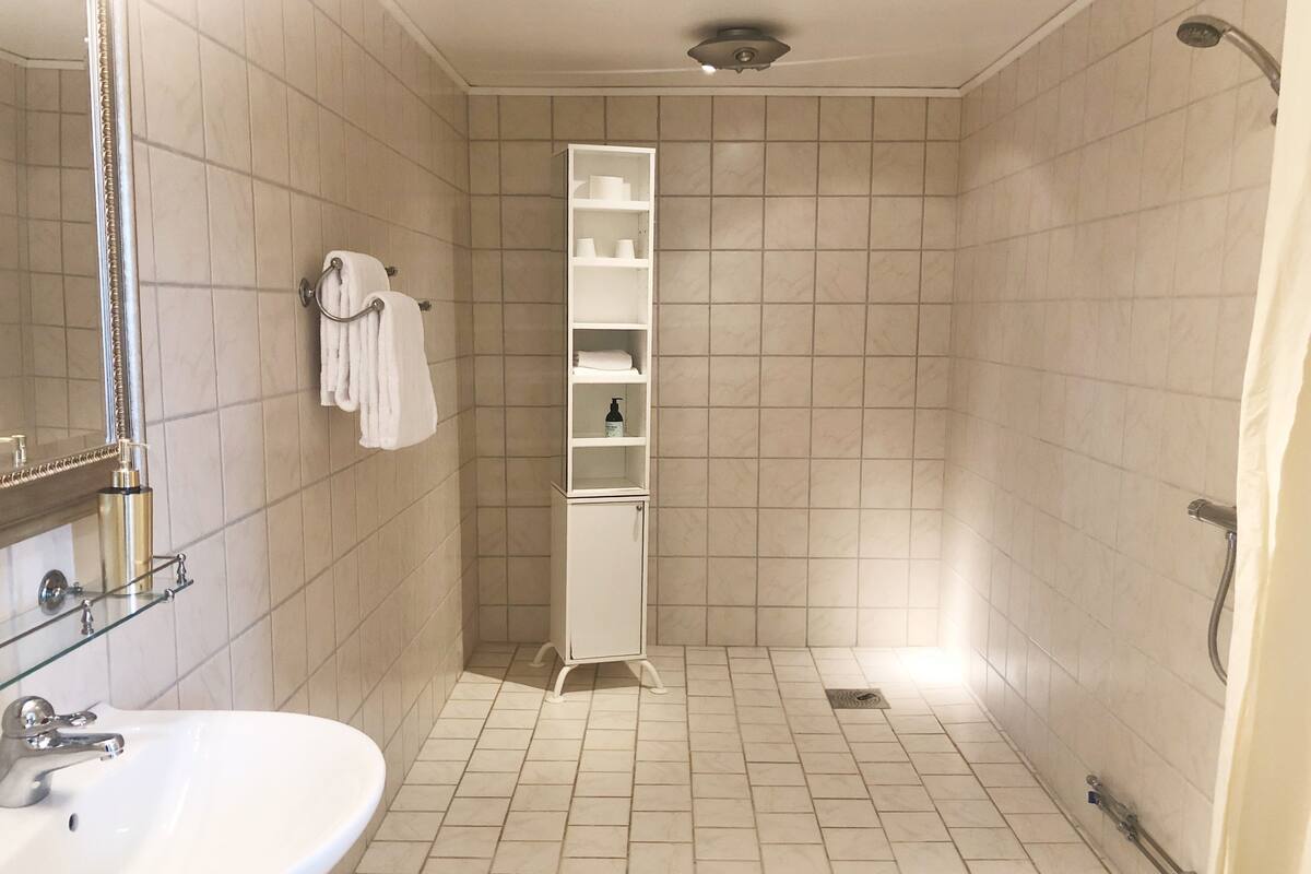 junior suite | bathroom | shower, eco-friendly toiletries, towels, soap