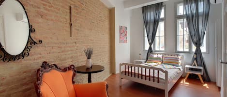 Deluxe Apartment, 2 Bedrooms, Balcony, City View | Individually decorated, individually furnished, desk, laptop workspace