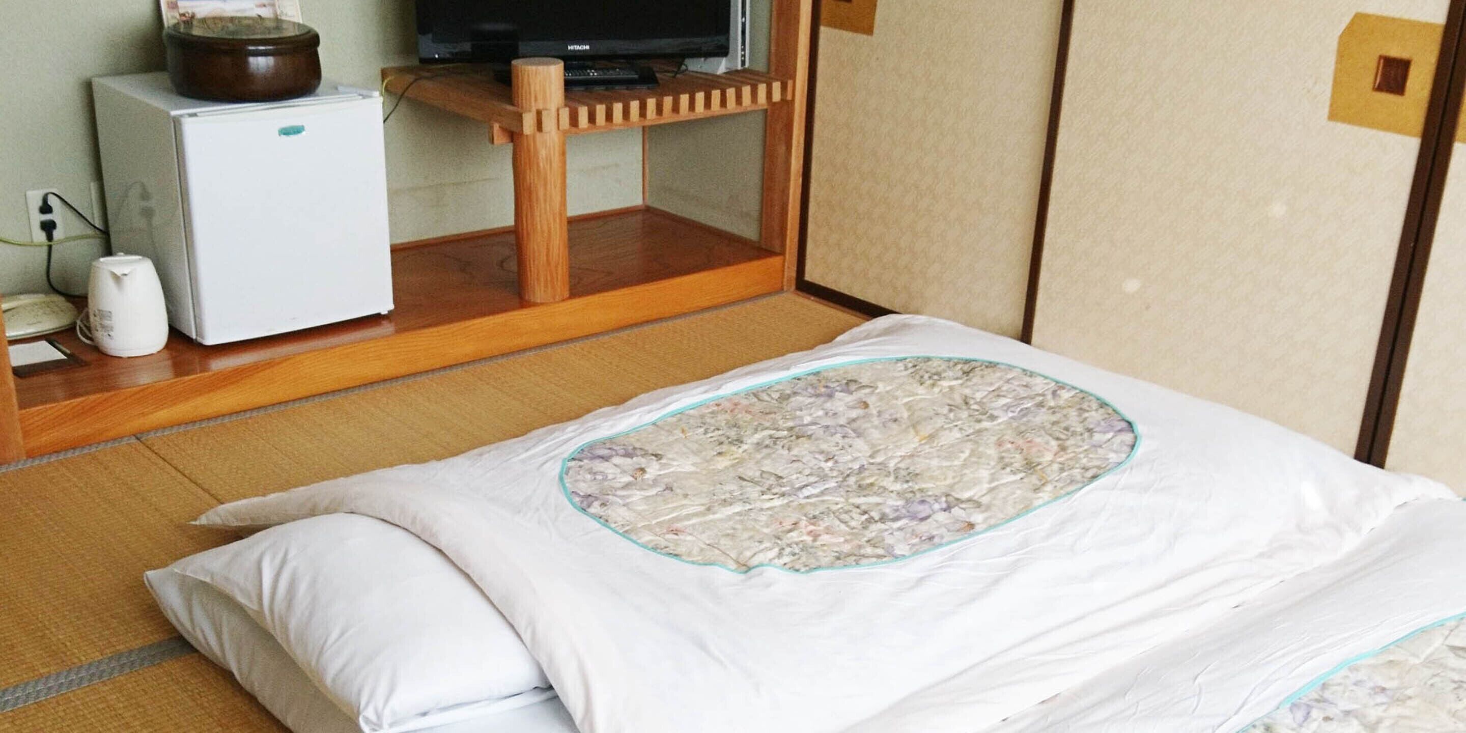 Japanese Style Room, Non Smoking or Smoking (advance request required) | Desk, free WiFi, bed sheets
