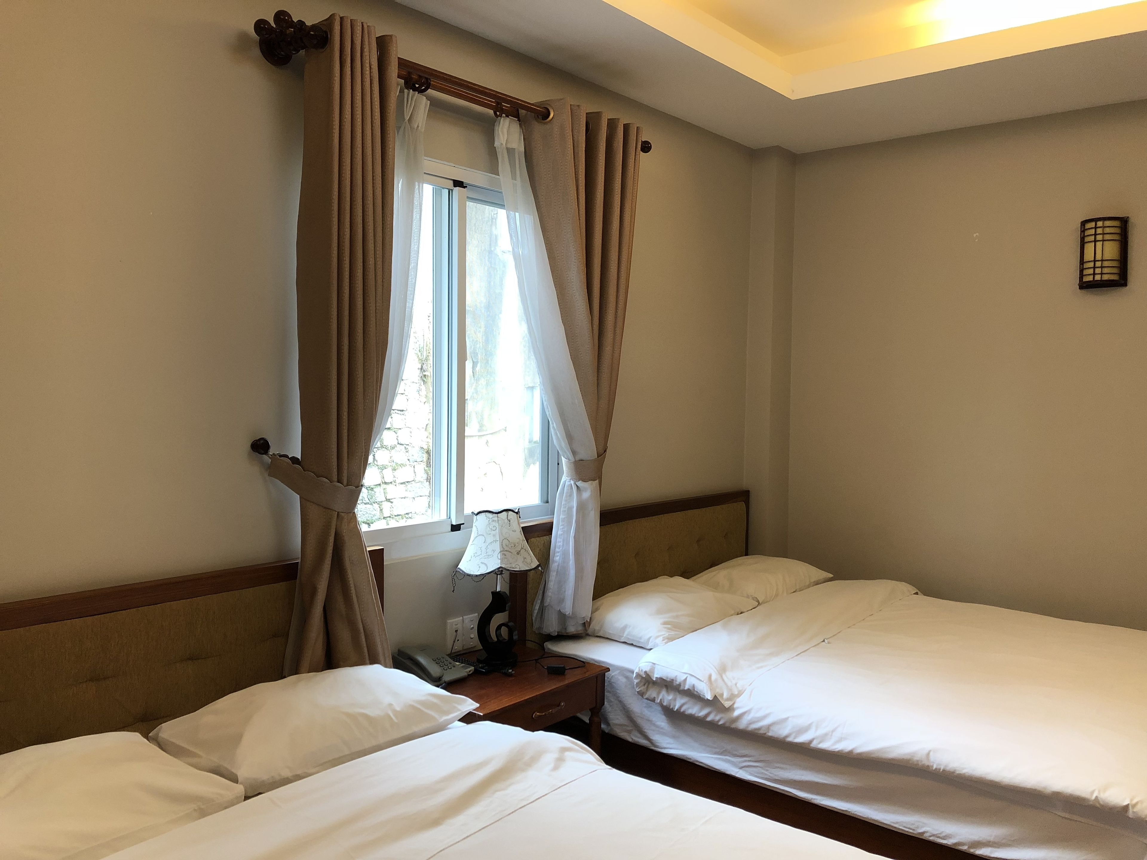 superior twin room | minibar, in-room safe, desk, blackout curtains