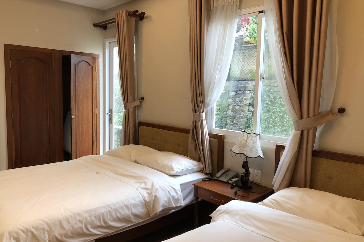 superior twin room | minibar, in-room safe, desk, blackout curtains