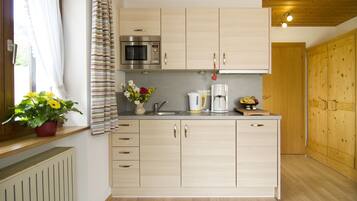 Apartment, 1 Bedroom, Balcony | Private kitchen | Full-size fridge, microwave, stovetop, dishwasher