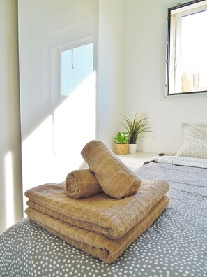 Penthouse de lujo, varias camas, para no fumadores | Sala de estar | Televisión de pantalla plana 