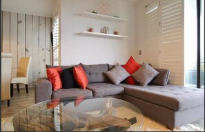 Apartment, 2 Bedrooms, Non Smoking | Living room | 42-inch flat-screen TV with cable channels, TV, fireplace