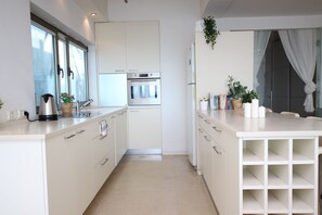 Deluxe Apartment, Multiple Beds, Non Smoking | Private kitchen | Full-size fridge, microwave, oven, stovetop - One of a Kind Gordon Beach Front 2BR Apt (Tel Aviv)
