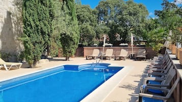 Outdoor pool, open 11:00 AM to 9:00 PM, sun loungers