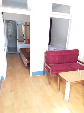 Individually furnished, desk, laptop workspace, rollaway beds